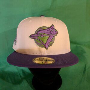 Blue Jays purple world series ball cap.